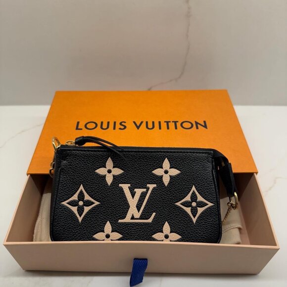 Louis Vuitton Handbags - Micro Louis Vuitton; New with Box and Duster